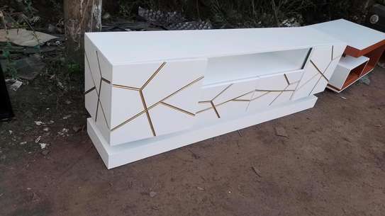 TV stand of white colour is ready for sale image 1