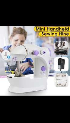 Mini sewing machine image 1