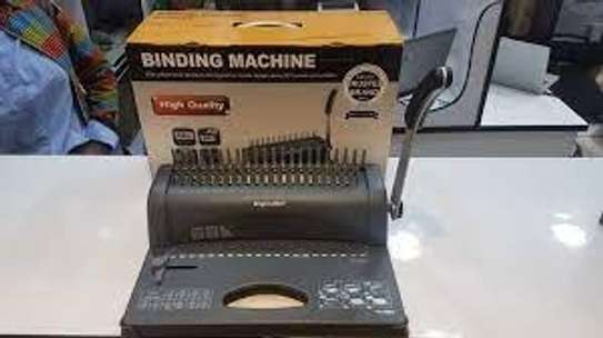 binding machine bright office. image 2