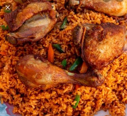 Biryani and Jollof Rice and Chicken. image 1