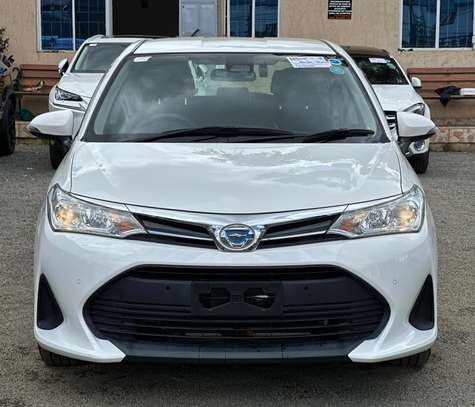 Toyota Fielder hybrid 1500cc white color 2018 model. image 10