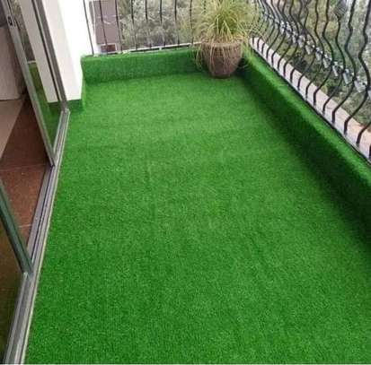 perfectly installed artificial grass for a balcony image 1