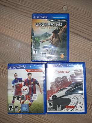 PSVITA  FIFA14, UNCHARTED, MOST WANTED 3PCS GAMES image 1