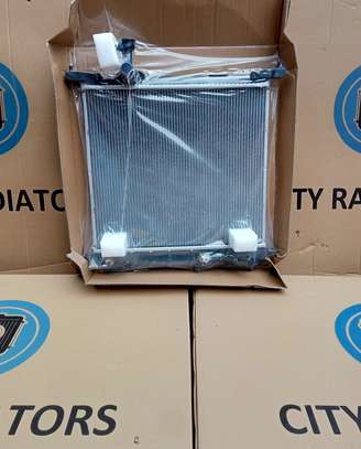 Brand new radiator for Nissan March Ak13. image 1
