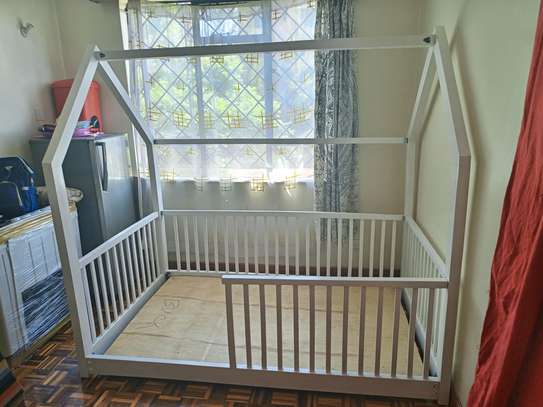 Kids bed with barrier image 1