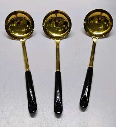 Single golden serving spoon image 5