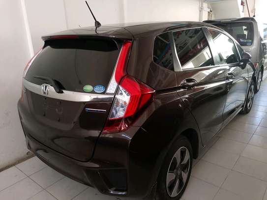 Honda fit hybrid maroon image 5