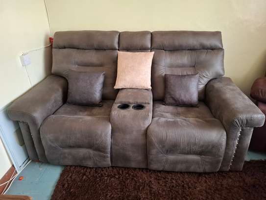 2 seater sofa with storage in middle image 1