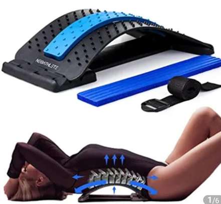 Massager/stretcher for back pain relief image 1
