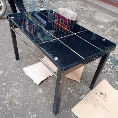 Black checked dining table with rubbered legs image 1