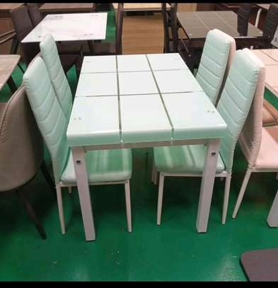 Four seater luxury dining table with chairs image 1