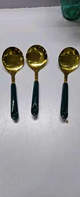 Single golden serving spoon image 3
