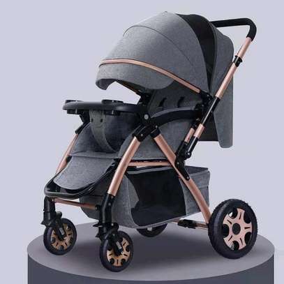 Foldable baby stroller with reversible hanldes image 1