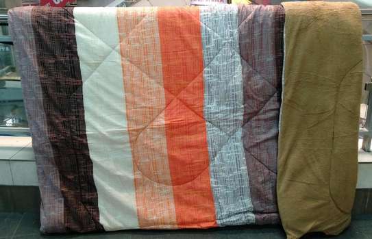 7 piece cotton/woolen duvet sets  with matching curtains. image 10