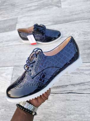 White sole brogues image 3