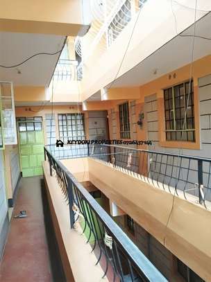 Double room with a toilet image 1