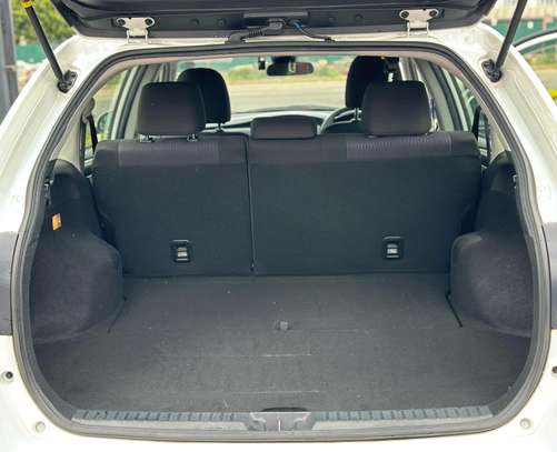 Toyota Fielder hybrid Pearl white color 2018 model . image 9