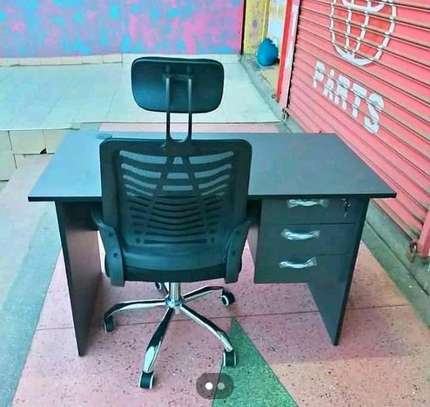 Adjustable office chair with a desk image 1