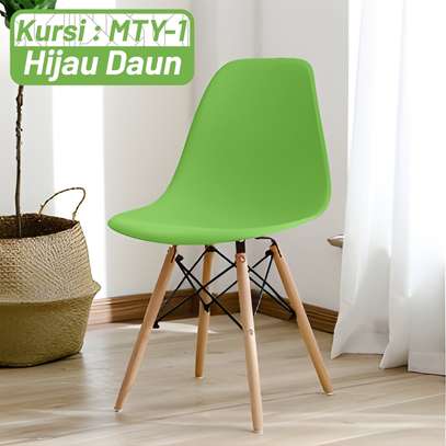 Plastic chairs: Green plastic eames dine chair image 2