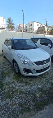 Suzuki swift white 2017 image 2