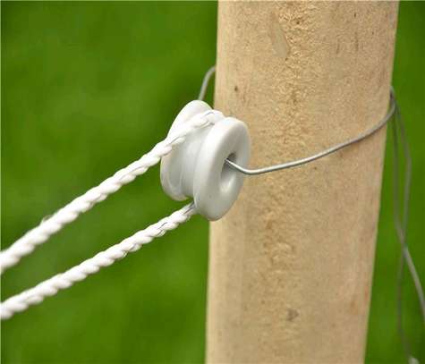 Porcelain bobbin electric fence wire insulator. image 2