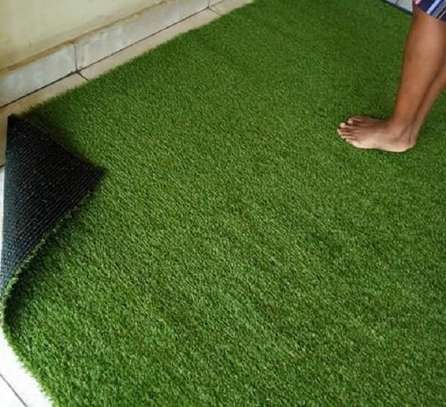 Verdant environment on artificial grass carpet image 2
