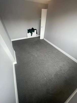 Grey fitted wall to wall carpet image 3