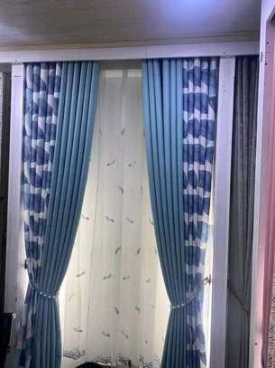 PLAIN BLUE AND PRINTED CURTAINS image 5