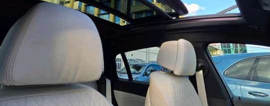 Make BMW X6 Blue colour 2020 model fully loaded. image 6