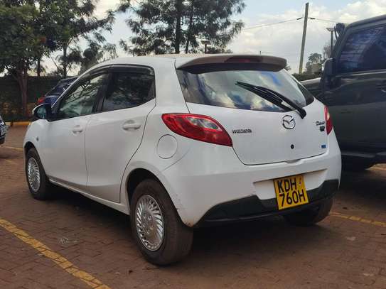 Mazda demio 1300cc white image 2