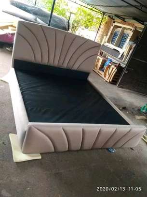 Modern upholstered tufted king-size bed image 1
