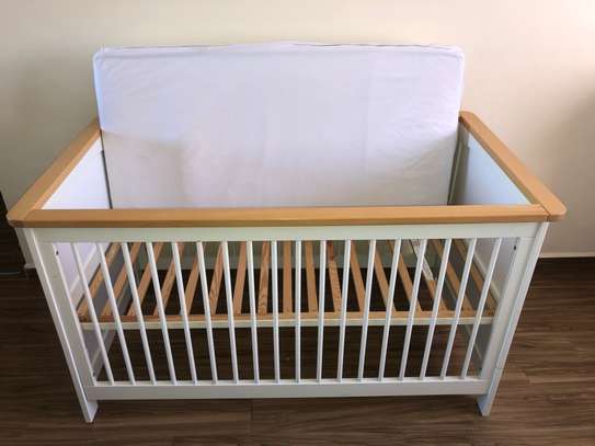 Kids cot bed with mattress, converts to bed image 1