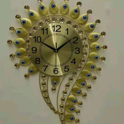 *????Question mark and Eye Design wall clocks * 

Available in Gold is and silver image 1