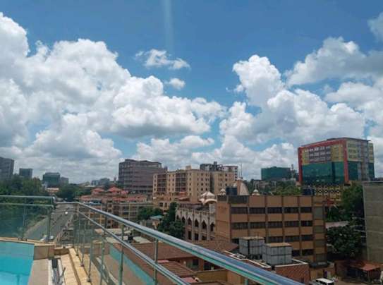Airbnb studio in Ngara with rooftop pool and cityview image 6