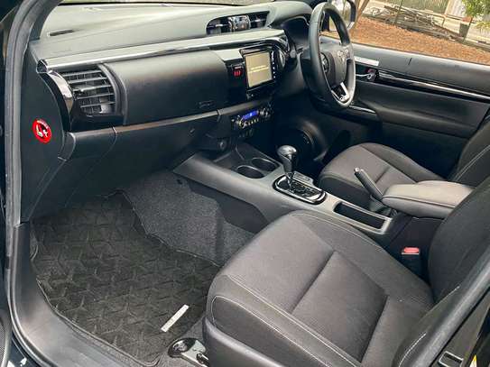 Toyota Hilux black color fully loaded 2019 model. image 13