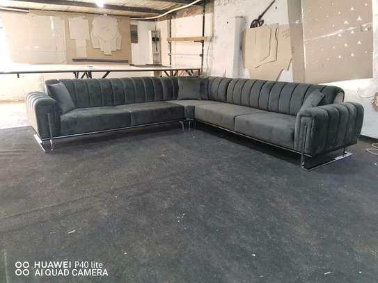 Seven seater charcoal black tufted sofa image 1
