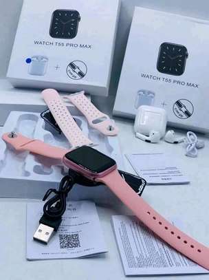 Smart watch with extra straps and earpods image 1