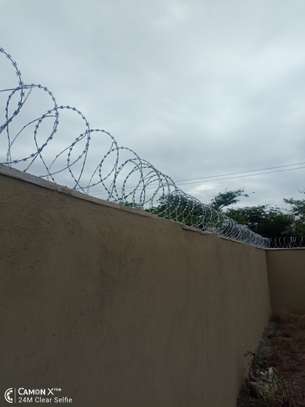 wall top electric fencing installation in kenya image 6