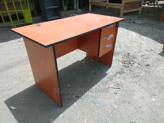 Office table with a set of drawers image 1