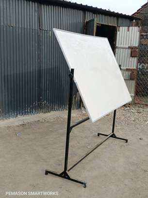 Rotational double sided whiteboards with a stand image 1