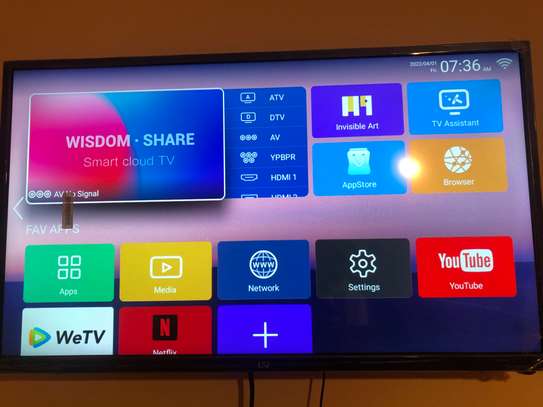 LSJ smart Tv 32” comes with a free TV mount image 1