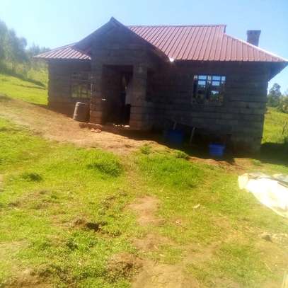 1.5 acres touching tarmac with house near Ol kalou. image 2