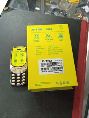 X Tigi 3308 Super Tiny phone - Dual Sim, Fm Radio, Bluetooth image 2