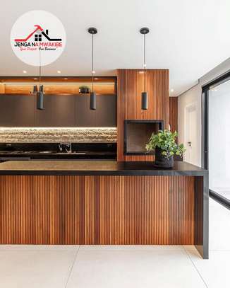 Flutted wall panel kitchen interior design image 1