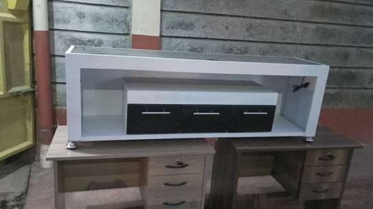 Universal tv stand with 3 drawers image 1