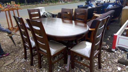 Dinning table with 6 chairs purely wood only image 1
