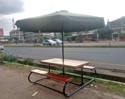Outdoor bench with umbrella image 1