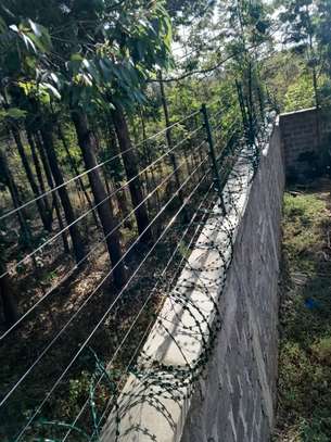 Electric fence installation in Kenya image 2