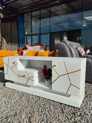 Modern White TV Stand with Gold Geometric Accents image 3