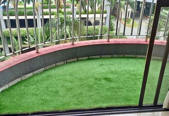 Quality artificial green grass carpet. image 2